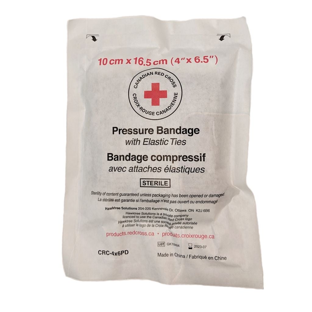 Pansement compressif stérile avec attaches élastiques